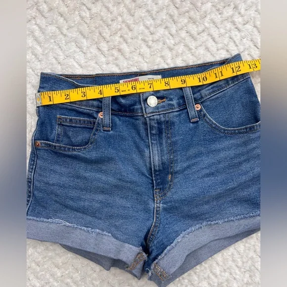 Levi’s High Rise Festival Light Blue Wash Denim Cutoff Frayed Cuffed Hem Shorts - Picture 8 of 11